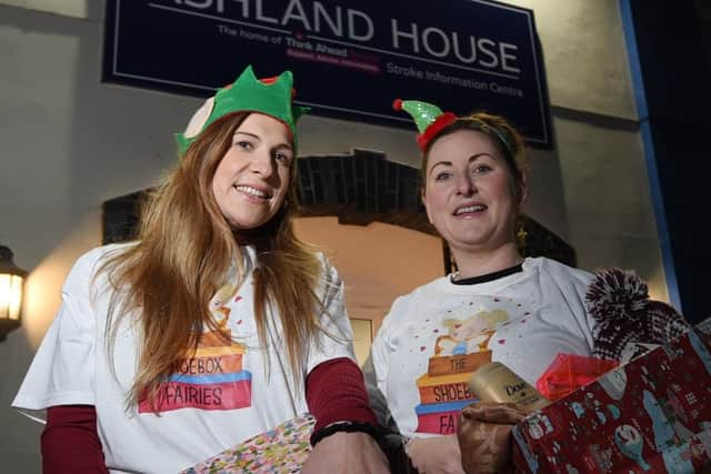 WIGAN - 17-11-21  from left, Emma Thornton and Kelly Parkinson, right, launch their Christmas appeal to help vulnerable people in Wigan, one of the donations points is Ashland House, Ince.