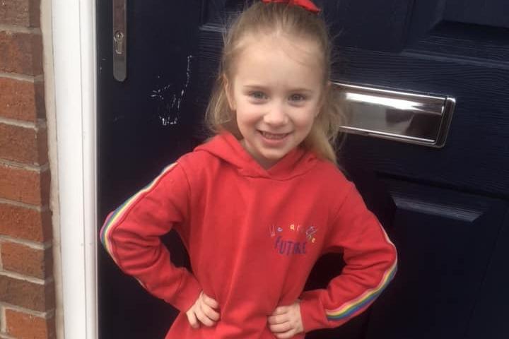 Annie Hesketh. Age 4, wearing red for Red Nose Day