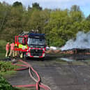 Greater Manchester Fire and Rescue Service attend the blaze in a field off Winstanley Road, Orrell