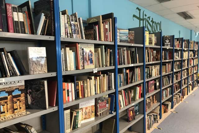 There are thousands of books in the new shop