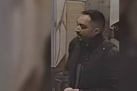 GMP released this CCTV image of a man they would like to speak to in connection with a 'high-value' shop theft