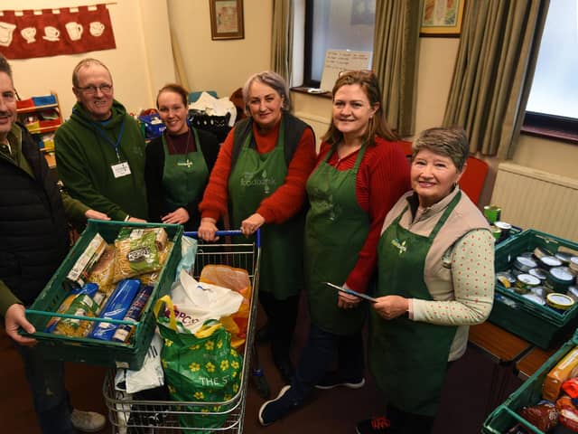 Staff and volunteers at the food bank based at Kingsleigh Methodist Church, Leigh.  A rise in the use of food banks has been recorded. From left, Warren Done, Russ Eddison, Rachael Morgan, Pat Sanderson, Alison Hampson and Pat Hornby.
