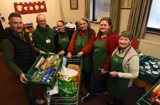 Staff and volunteers at the food bank based at Kingsleigh Methodist Church, Leigh.  A rise in the use of food banks has been recorded. From left, Warren Done, Russ Eddison, Rachael Morgan, Pat Sanderson, Alison Hampson and Pat Hornby.