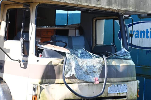 General view of the damage by vandals and arsonists on buildings, vehicles and machinery owned by a member of the traveller community Richard Price