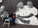 Scott from Snow Graffiti, working on the Beth Mead and Ella Toone piece