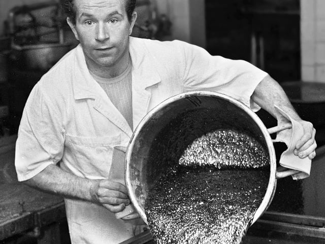 David Butler pours out a mixture for Uncle Joe's Mint Balls at the Santus factory in Dorning Street, Wigan, in July 1977.