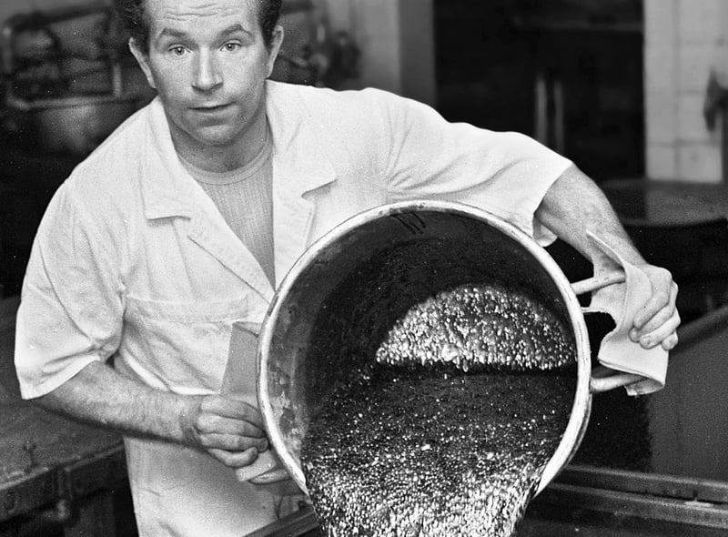 David Butler pours out a mixture for Uncle Joe's Mint Balls at the Santus factory in Dorning Street, Wigan, in July 1977.