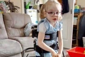 Abigail with her gait walker from Blessing in Disguise. After using the walker for some while she is able to walk unaided.