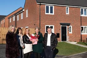 Resident Katie is welcomed to her new home by Coun Gambles, Hilary Roberts and Peter Barlow