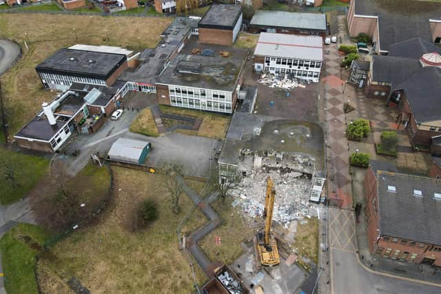 A drone camera view of the demolition of the old Pemberton High School buildings on Montrose Avenue