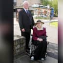 John Greenwood with the un-named disabled woman for whom he is a carer