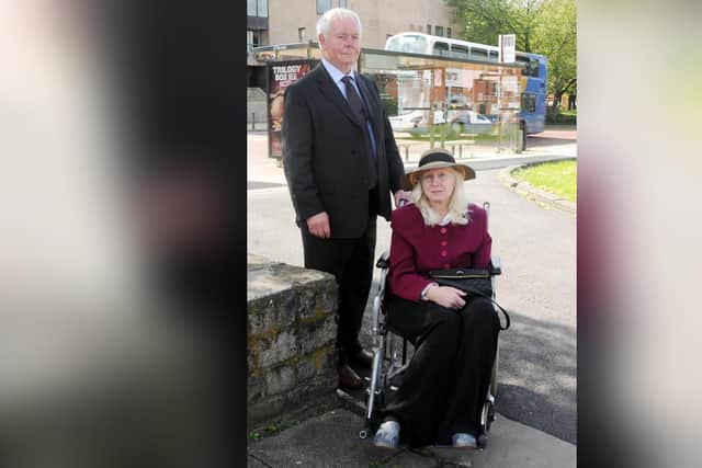 John Greenwood with the un-named disabled woman for whom he is a carer