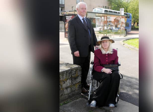 John Greenwood with the un-named disabled woman for whom he is a carer