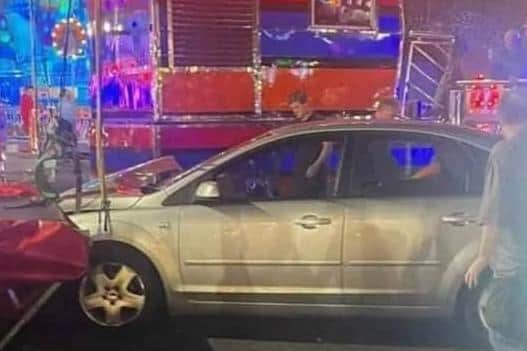 The Ford Focus at the fun fair after being abandoned after the collision