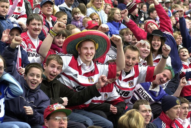 Wigan Warriors fans in good spirits during the Good Friday Super League clash against St. Helens at the JJB Stadium on 13th of April 2001.
The match was a 22-22 draw.