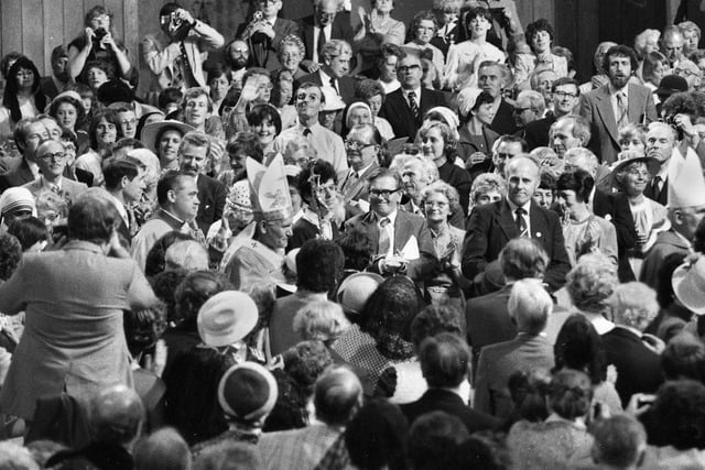 Pope John Paul 11 thronged by the congregation as he arrives to celebrate Mass at the Metropolitan Cathedral of Christ the King during his visit to Liverpool on Sunday 30th of May 1982.