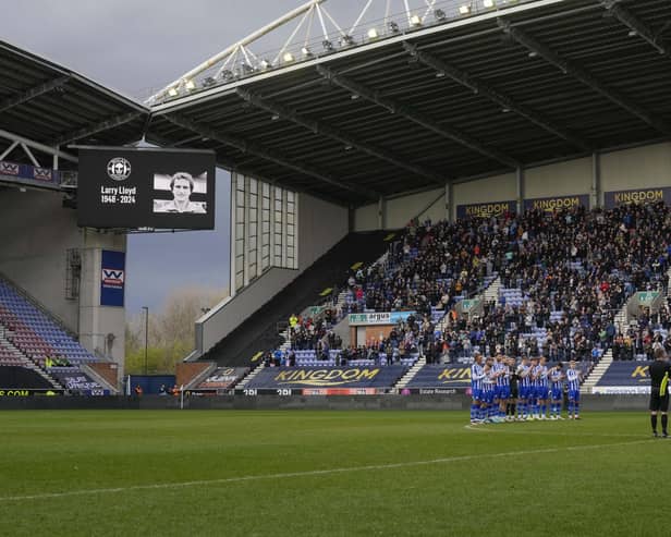 The DW Stadium paid its tribute to former Latics player/manager Larry Lloyd before the Good Friday clash against Burton