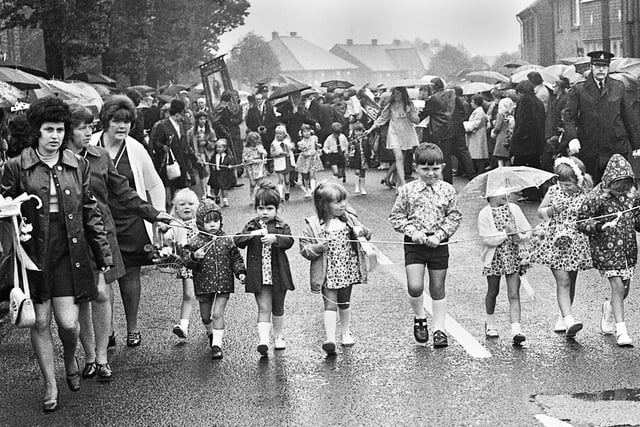 A rainy day on Sunday 24th of June 1973 as the St. Paul's, Goose Green, walking day gets under way.