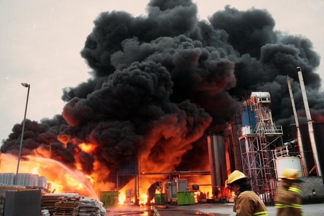 Firefighters tackle the huge blaze at the Ruberoid Building Products factory in Appley Bridge on Monday 12th of June 2000.