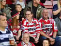 Wigan Warriors fans at the DW Stadium for the game against Salford Red Devils.