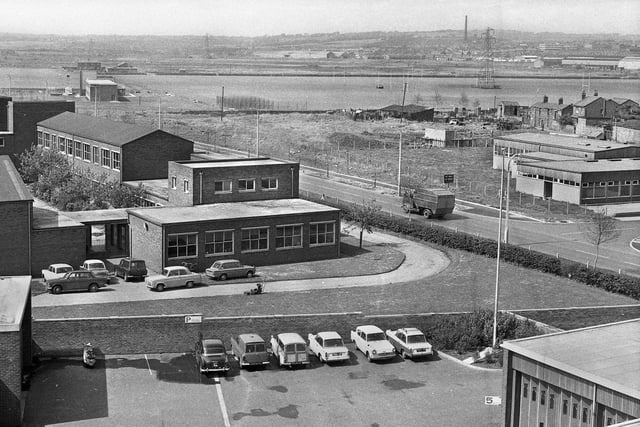 A view along Robin Park Road, Newtown, in the 1960s. On the left is St. Thomas More Secondary Modern School and on the right Wigan Boys' Club in Wenlock Street.
In the background are the old Robin Park playing fields. 