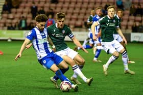 Owen Dale finds himself crowded out by the Bolton defence