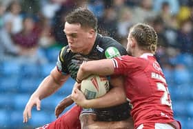 Rising Wigan Warriors prop Harvie Hill returned to first-team action against Salford Red Devils