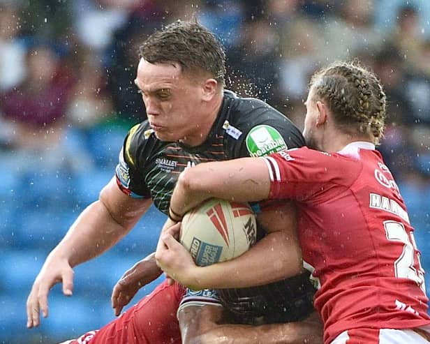 Rising Wigan Warriors prop Harvie Hill returned to first-team action against Salford Red Devils