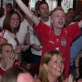 EURO 2004
The scene at Wigan's town centre pub Moon Under Water as England score against France ... before it all went horribly wrong