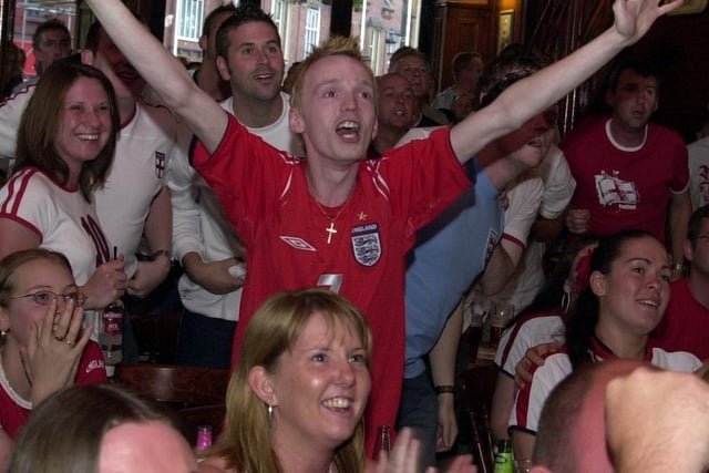EURO 2004
The scene at Wigan's town centre pub Moon Under Water as England score against France ... before it all went horribly wrong