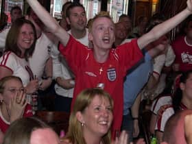 EURO 2004
The scene at Wigan's town centre pub Moon Under Water as England score against France ... before it all went horribly wrong