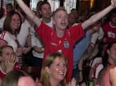 EURO 2004
The scene at Wigan's town centre pub Moon Under Water as England score against France ... before it all went horribly wrong