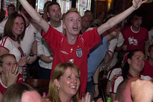 EURO 2004
The scene at Wigan's town centre pub Moon Under Water as England score against France ... before it all went horribly wrong
