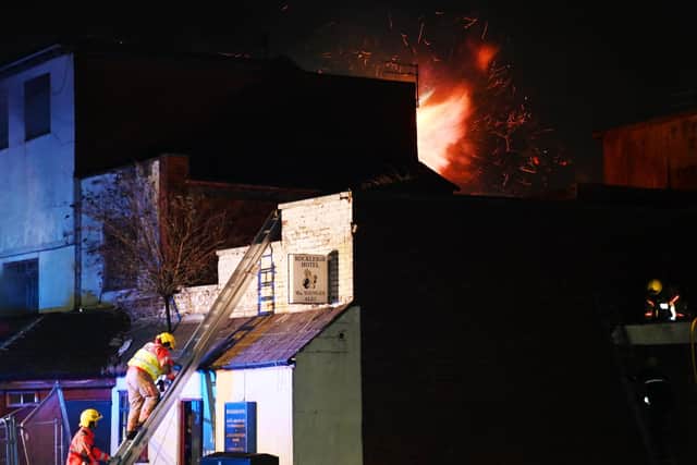 Firefighters tackling the blaze at the former Rockleigh Hotel last night