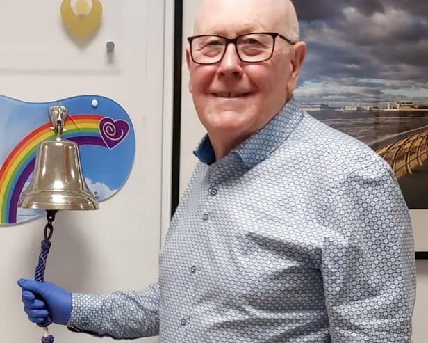 Tom Critchley rings the all clear bell