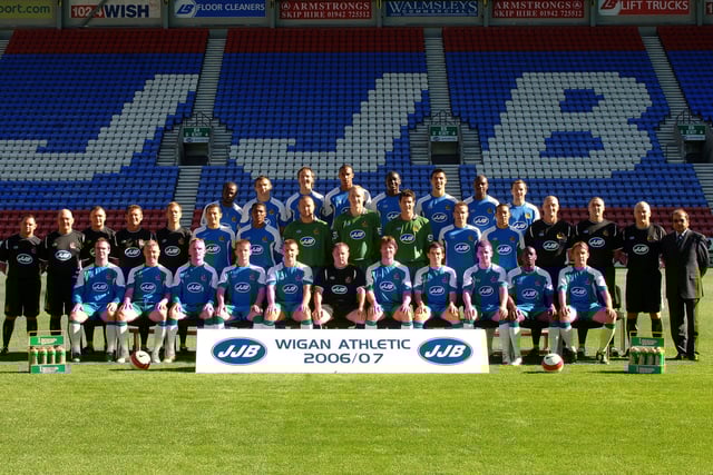 Wigan Athletic Team Shoot 2006
Back Row LtR: Pascal Chimbonda, Lee McCulloch, Andy Webster, Fitz Hallm Emile Heskey, Paul Scharner, Emerson Boyce, David Connolly.
Middle Row LtR: Joey Gallanagh first team fitness co ordinator, Alan Jackson chief kit manager, Dave Hallam masseur, Chris Hutchings asst manager, Alan Tomlinson head of physiotherapy. Josip Skoko, Antonio Valencia, John Filan, Chris Kirkland, Mike Pollitt, David Wright, Denny Landzaat, Gary Walsh gol keeping coah, Mark Seagraves first team coach, Alex Cribley physiotherapist, Dr A Zaman head of medicine.
Front Row, Steve McMillan, Graham Kavanagh, Gary Teale, Tomasz Cywka, Matt Jackson, Paul Jewell (Manager), Arjan de Zeeuw, Leighton Baines, Ryan Taylor, Henri Camara and Andreas Johansson.