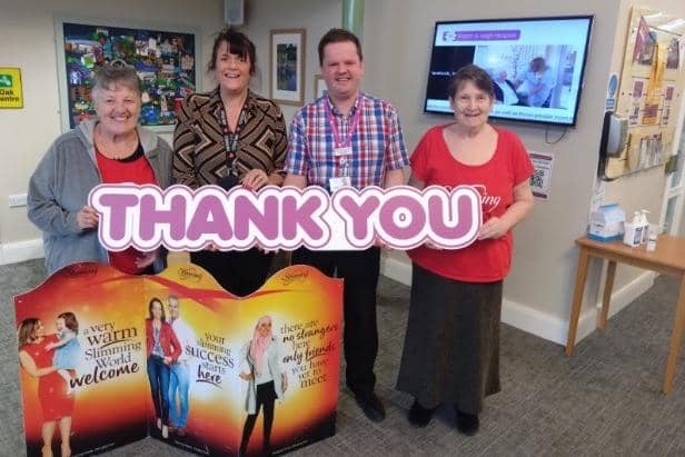 Slimming World leaders visited Wigan and Leigh Hospice to hand over a cheque after their Christmas ball