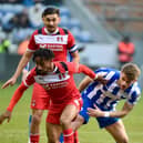 Charlie Kelman gets stuck in against Leyton Orient