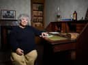 Miriam Margolyes with A Christmas Carol book by Charles Dickens at Gunnersbury Park Museum