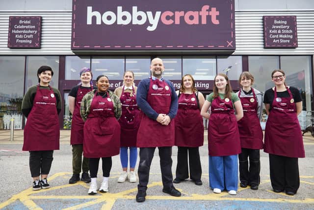 Hobby Craft store manager Andrew Toth (centre) with his team ahead of the opening of the new store