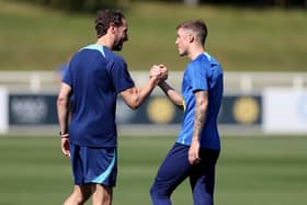 Alfie Devine with Gareth Southgate during an England senior training session earlier this season.