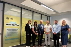 Coun Gambles and council leader Coun Molyneux with council officers