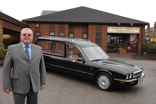 Brian Halliwell with the hearse that was used for the Queen Mother's funeral