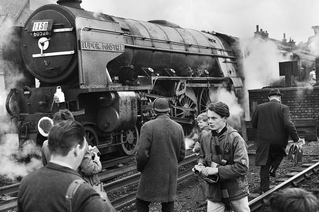 Tudor Minstrel, the last train on its way to do the Waverley run from Carlisle to Edinburgh attracts a lot of interest as it passes through Wigan North Western Station in April 1966.
The Waverley line was a double track line which first opened in 1849 and was due to close under the Beeching Axe of many passenger lines throughout the British Isles at that time.