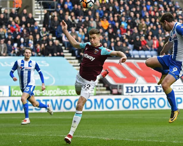Reece Burke tasted defeat on his return to Wigan with West Ham in the FA Cup in 2017/18