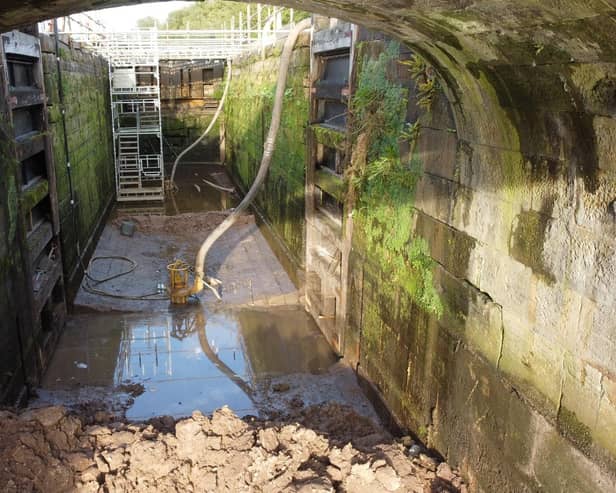 The vital repair work on one of the locks on the Wigan flight has taken longer than expected