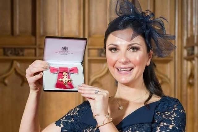 Alex Johnson with her OBE