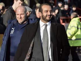 Latics chairman Talal Al Hammad, with club doctor Jonathan Tobin