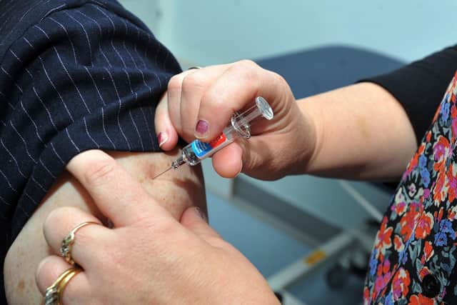 People in Wigan are urged to get the flu vaccine