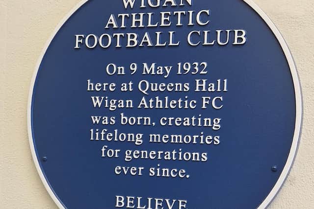 A blue plaque at Queen's Hall Methodist Mission marks it as the birthplace of Wigan Athletic